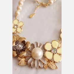 Perlekde med blomster